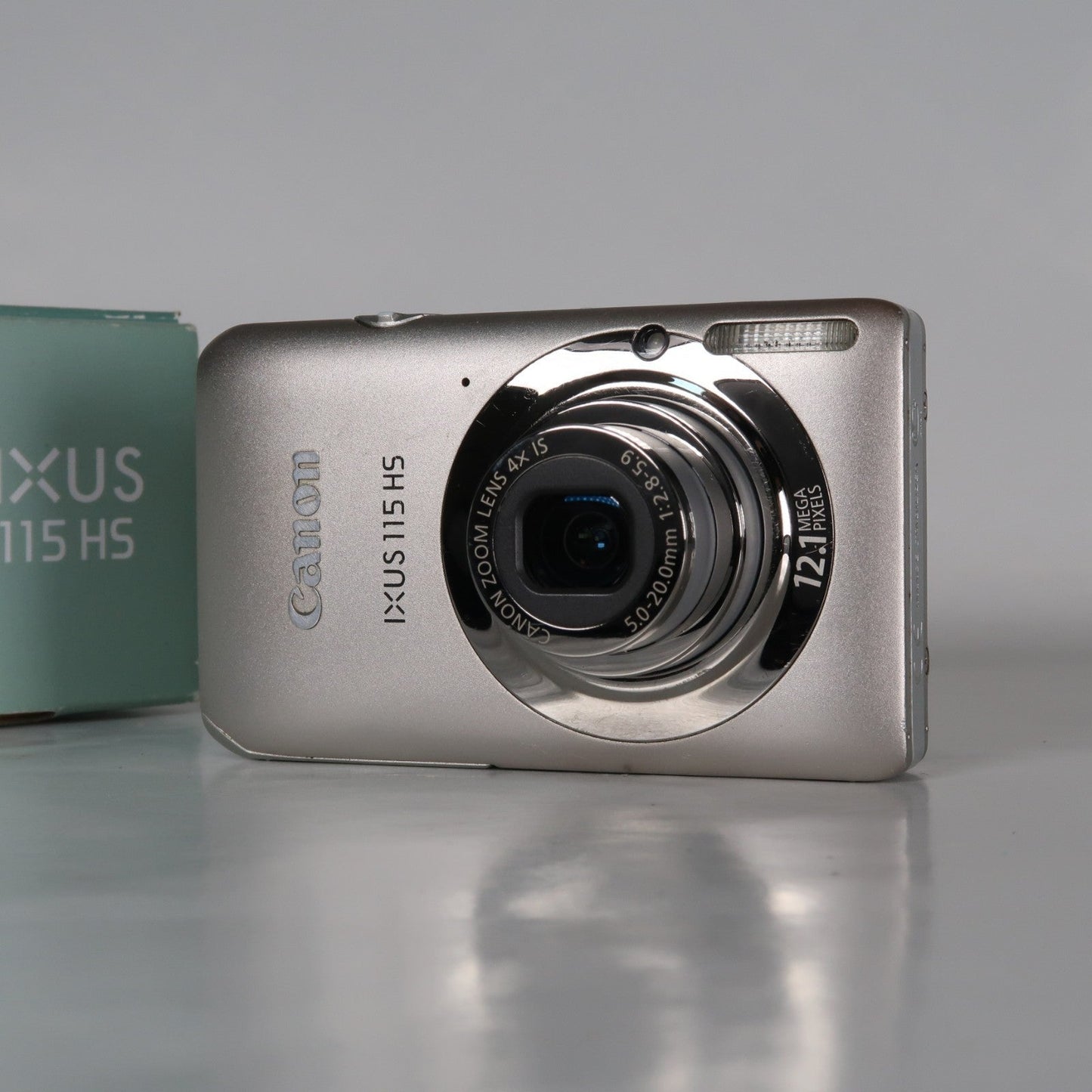 Cenon IXUS 115 HS PowerShot ELPH 100 HS 12.1MP 4x Digital Camera Silver – Very Good Condition