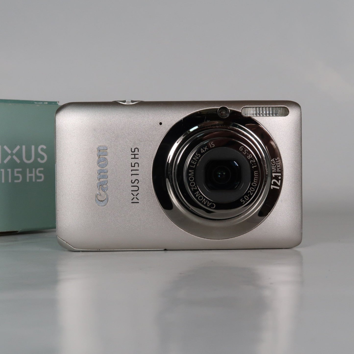 Cenon IXUS 115 HS PowerShot ELPH 100 HS 12.1MP 4x Digital Camera Silver – Very Good Condition